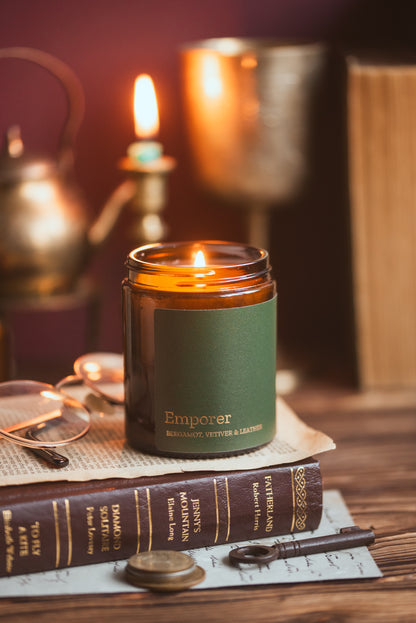 Bergamot, vetiver, and leather scented soy candle in a sleek container, perfect for men's home ambiance by COSYPLACE CANDLES.